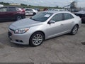 2014 Chevrolet Malibu — photo 2 of 11 | VIN 1G11H5SL5EF233144