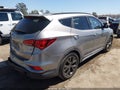 2017 Hyundai Santa Fe — photo 4 of 15 | VIN 5XYZW4LA8HG398064