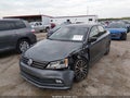 2015 Volkswagen Jetta — photo 2 of 16 | VIN 3VWD17AJ1FM420884