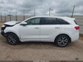 2016 Kia Sorento — photo 14 of 16 | VIN 5XYPK4A52GG109347