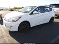 2013 Hyundai Accent — photo 2 of 17 | VIN KMHCU5AE8DU077752