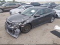 2016 Honda Civic — photo 2 of 16 | VIN 19XFC2F55GE023341