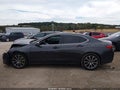 2015 Acura TLX — photo 13 of 15 | VIN 19UUB2F58FA015490