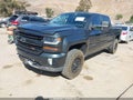 2017 Chevrolet Silverado 1500 — photo 2 of 20 | VIN 3GCUKREC6HG419013