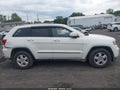 2011 Jeep Grand Cherokee — photo 13 of 16 | VIN 1J4RR4GG3BC585353