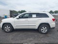 2011 Jeep Grand Cherokee — photo 14 of 16 | VIN 1J4RR4GG3BC585353