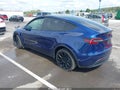 2022 Tesla Model Y — photo 3 of 19 | VIN 7SAYGDEE1NF412322