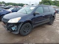 2011 Chevrolet Traverse — photo 2 of 17 | VIN 1GNKRFED1BJ204131
