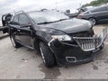 2013 Lincoln MKX — photo 1 of 16 | VIN 2LMDJ6JK4DBL47448