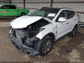 2015 Hyundai Santa Fe — photo 2 of 17 | VIN 5XYZU3LB1FG242776
