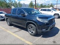 2023 Honda Ridgeline — photo 1 of 17 | VIN 5FPYK3F54PB004475