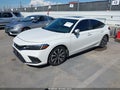 2024 Honda Civic — photo 2 of 16 | VIN 19XFL1H77RE014054
