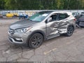 2017 Hyundai Santa Fe — photo 2 of 16 | VIN 5XYZW4LA0HG474120