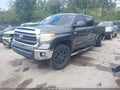 2015 Toyota Tundra — photo 2 of 19 | VIN 5TFDW5F18FX459953