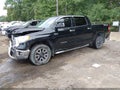 2016 Toyota Tundra — photo 2 of 16 | VIN 5TFHY5F19GX524256