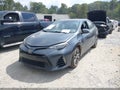 2018 Toyota Corolla — photo 2 of 16 | VIN 5YFBURHE7JP822139