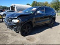 2014 Jeep Grand Cherokee — photo 2 of 16 | VIN 1C4RJFCT2EC105836
