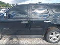 2011 Chevrolet Tahoe — photo 14 of 16 | VIN 1GNSCBE03BR139159
