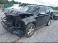 2011 Chevrolet Tahoe — photo 2 of 16 | VIN 1GNSCBE03BR139159