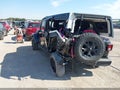 2022 Jeep Wrangler Unlimited — photo 3 of 15 | VIN 1C4HJXDG1NW223765