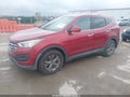 2014 Hyundai Santa Fe — photo 2 of 12 | VIN 5XYZT3LB6EG189722