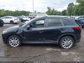 2015 Mazda CX-5 — photo 14 of 16 | VIN JM3KE4DY2F0508097