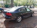 2012 Volkswagen Passat — photo 4 of 13 | VIN 1VWCM7A35CC009442