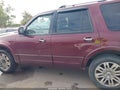 2011 Ford Expedition — photo 14 of 16 | VIN 1FMJU2A55BEF25734