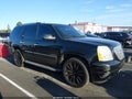 2011 GMC Yukon — photo 13 of 16 | VIN 1GKS1EEF8BR143376