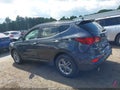 2017 Hyundai Santa Fe — photo 15 of 21 | VIN 5NMZUDLB8HH025336
