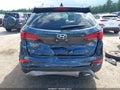2017 Hyundai Santa Fe — photo 18 of 21 | VIN 5NMZUDLB8HH025336