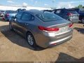 2016 Kia Optima — photo 3 of 17 | VIN 5XXGT4L39GG043988