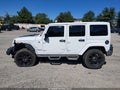 2014 Jeep Wrangler Unlimited — photo 14 of 21 | VIN 1C4HJWEG9EL320299