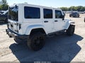 2014 Jeep Wrangler Unlimited — photo 4 of 21 | VIN 1C4HJWEG9EL320299