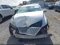 2009 Lincoln MKS — photo 13 of 17 | VIN 1LNHM93R59G628576