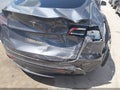 2023 Tesla Model Y — photo 20 of 22 | VIN 7SAYGAEE9PF708433