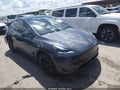 2023 Tesla Model Y — photo 1 of 22 | VIN 7SAYGAEE9PF708433