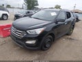 2015 Hyundai Santa Fe — photo 2 of 13 | VIN 5XYZU3LB3FG263449