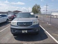 2012 Honda Pilot — photo 12 of 16 | VIN 5FNYF3H54CB010037