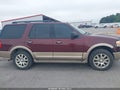2011 Ford Expedition — photo 13 of 16 | VIN 1FMJU1J53BEF15178