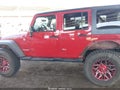 2009 Jeep Wrangler Unlimited — photo 14 of 16 | VIN 1J4GA691X9L757701