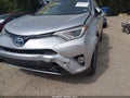 2016 Toyota RAV4 Hybrid — photo 6 of 16 | VIN JTMRJREV9GD039573