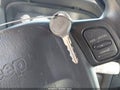 2000 Jeep Grand Cherokee — photo 11 of 16 | VIN 1J4GW48S5YC372769