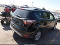 2018 Ford Escape — photo 4 of 16 | VIN 1FMCU9GD8JUD59567