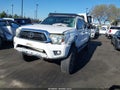 2015 Toyota Tacoma — photo 2 of 13 | VIN 5TFJU4GN2FX064641