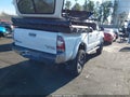 2015 Toyota Tacoma — photo 4 of 13 | VIN 5TFJU4GN2FX064641