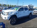 2015 Toyota Tacoma — photo 6 of 13 | VIN 5TFJU4GN2FX064641