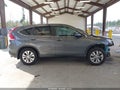 2014 Honda CR-V — photo 14 of 17 | VIN 5J6RM4H58EL104190