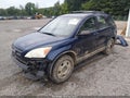 2009 Honda CR-V — photo 2 of 20 | VIN 5J6RE48389L034093