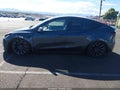 2023 Tesla Model Y — photo 12 of 14 | VIN 7SAYGDEF2PF835129